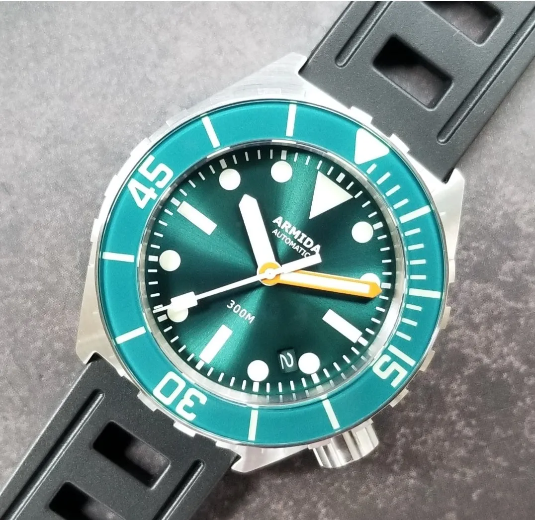 Armida A1 42mm steel teal sunray orange minute sapphire bezel