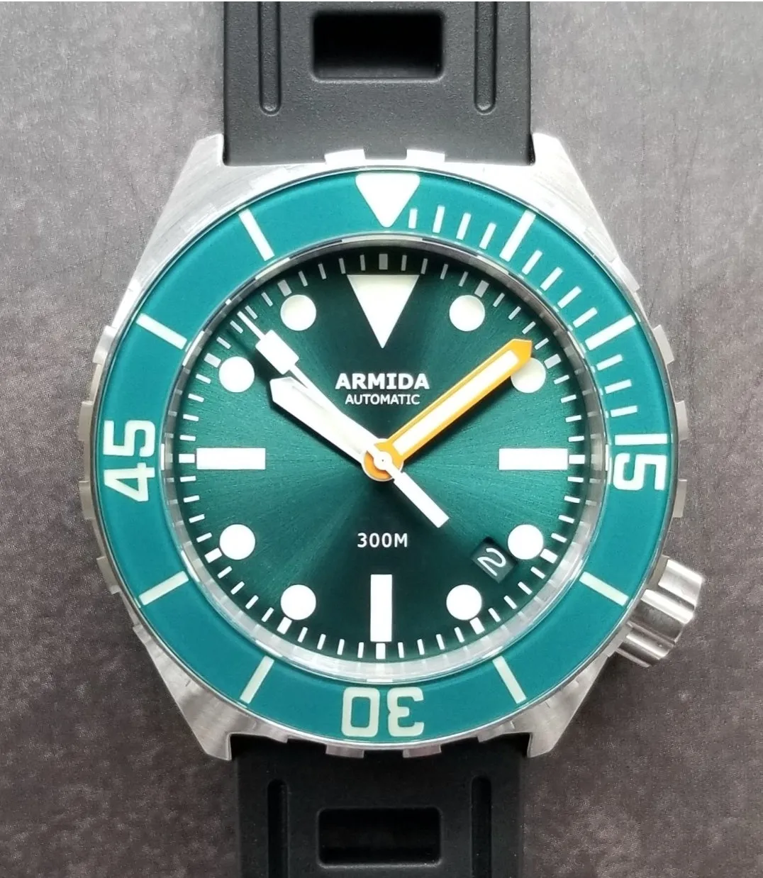 Armida A1 42mm steel teal sunray orange minute sapphire bezel